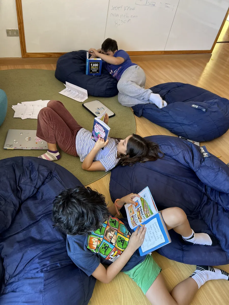 Learners reading and working independently during core skills at Acton Academy El Salvador