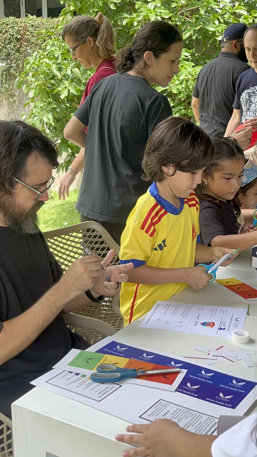 An Acton Academy El Salvador learner working alongside adults on a real project
